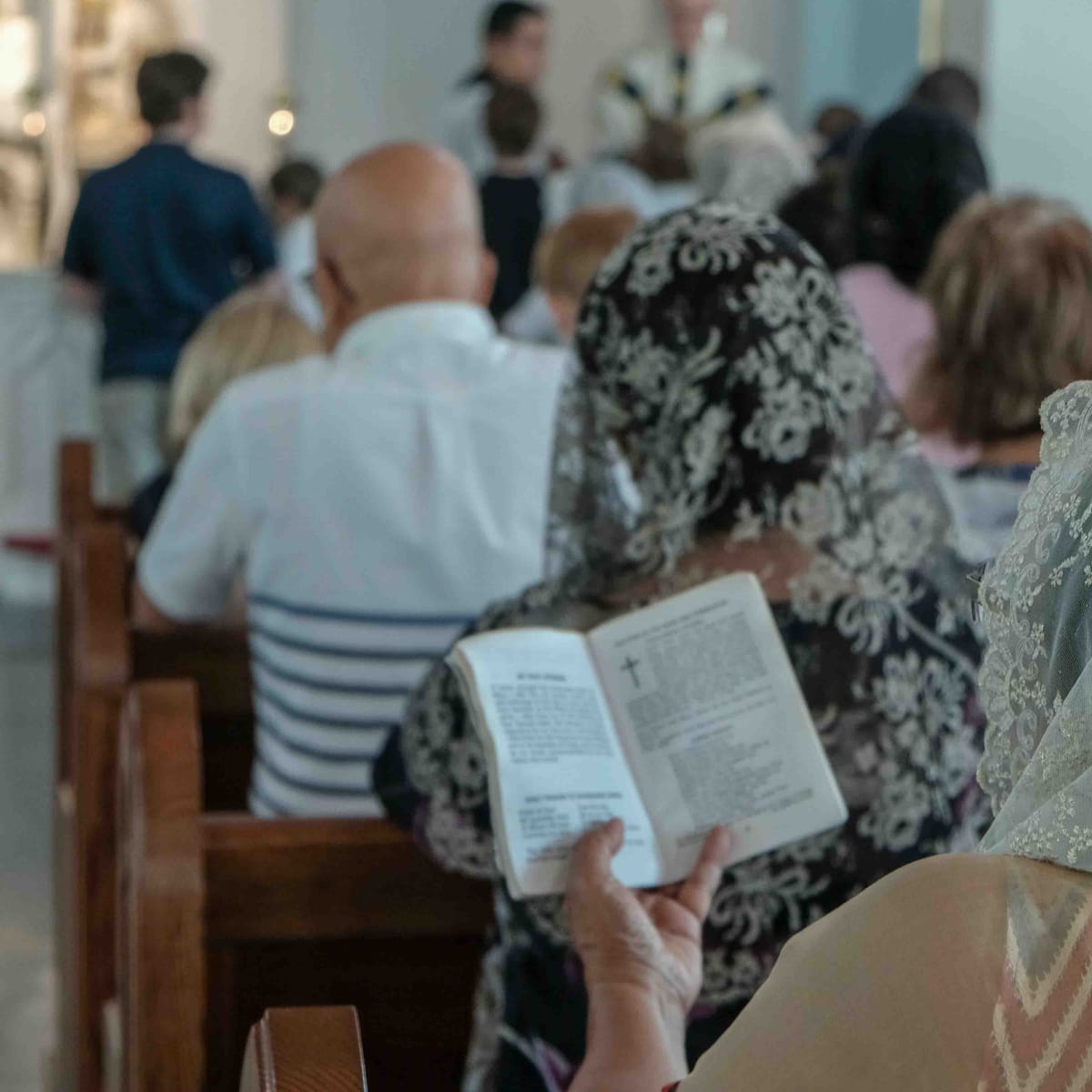 Laypeople at Latin Mass - Catholic Stock Photo