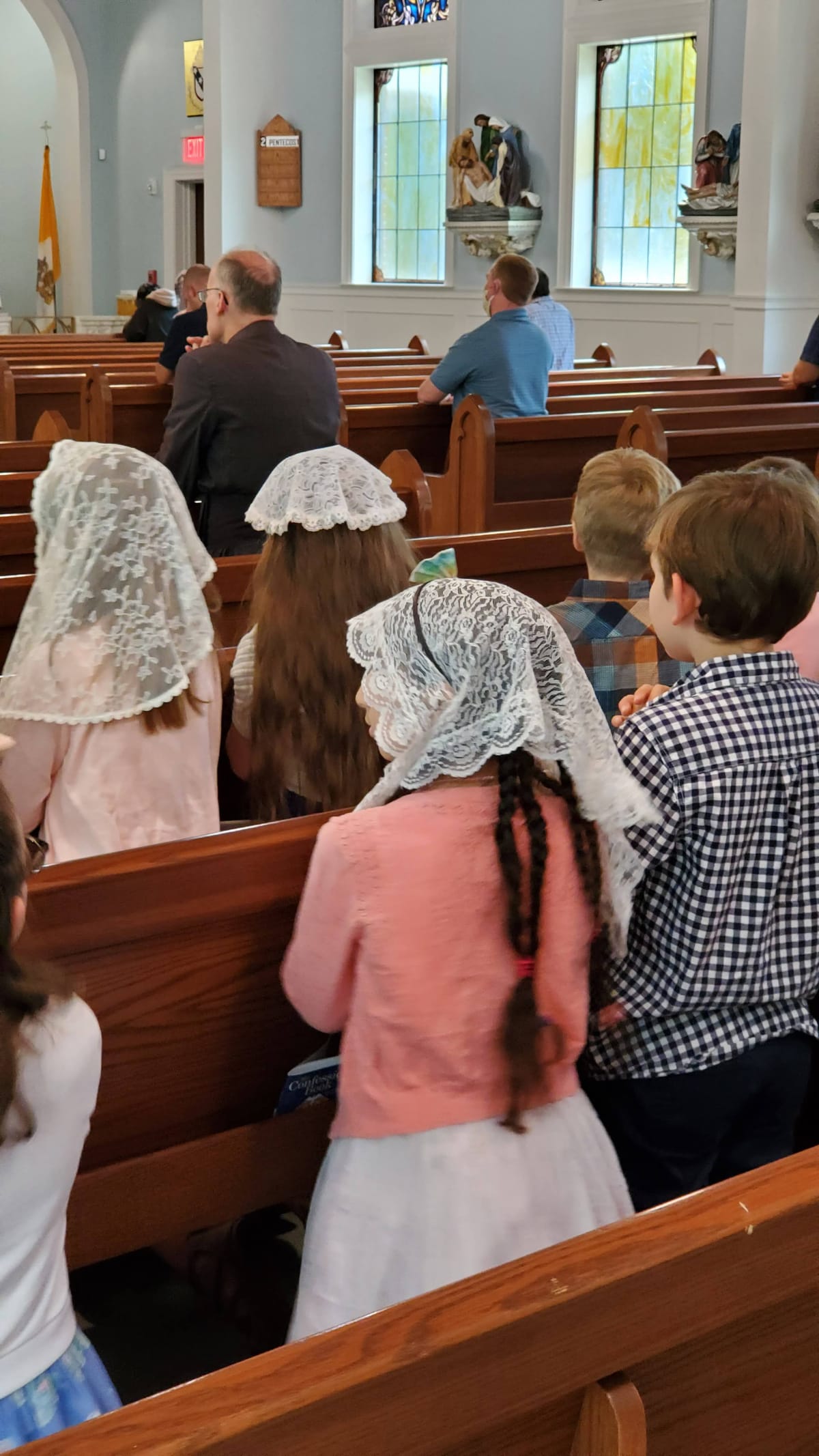 Children Praying before Mass - Catholic Stock Photo