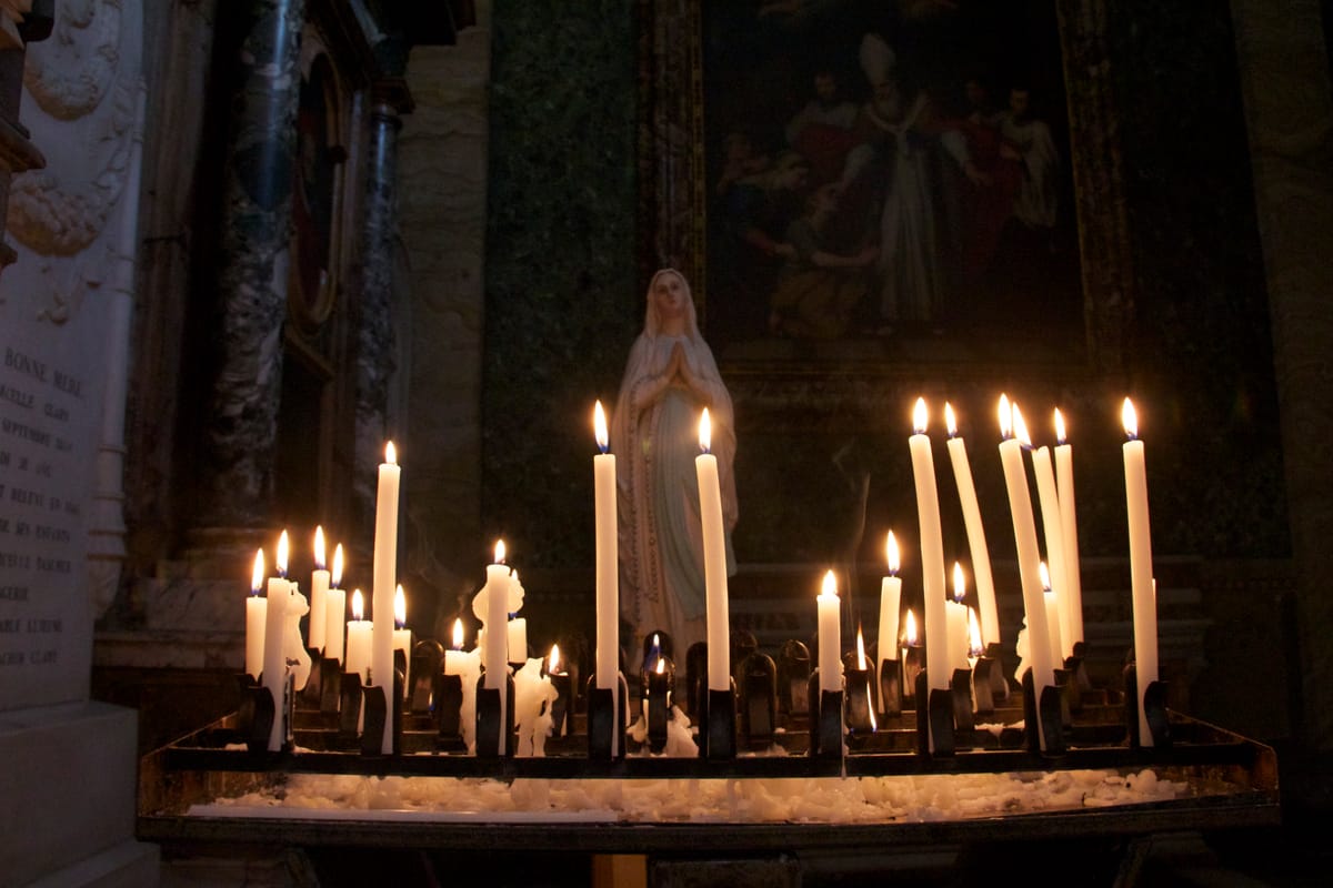 Votive Candles on Virgin Mary Shrine at San Luigi dei Francesi, Rome - Catholic Stock Photo